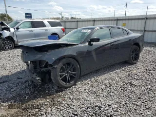 2018 Dodge Charger SXT Plus with VIN 2C3CDXHG2JH329120, listed as a Copart auction lot 49746455 with 106,182 mi miles and Salvage Title. Bid and sale history available at carsss.com. Image 1.