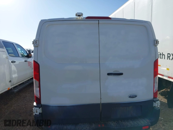 2015 Ford Transit Cargo with VIN 1FTNE1YMXFKB19773, listed as a IAAI auction lot 41700374 with 501,881 mi miles. Bid and sale history available at carsss.com. Image 16.