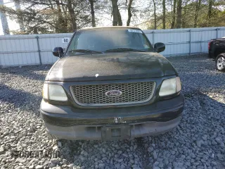 2002 Ford F-150 XL with VIN 1FTRX17L42NB06983, listed as a Copart auction lot 54172855 with 150,243 mi miles and Salvage title. Bid and sale history available at DreamBid. Image 5.