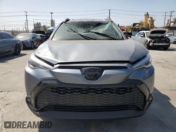 2024 Toyota Corolla Cross Hybrid S with VIN 7MUFBABG7RV043044, listed as a Copart auction lot 61828715 with 10,473 mi miles and Salvage title. Bid and sale history available at DreamBid. Image 5.