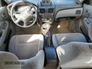 2001 Nissan Sentra GXE z VIN 3N1CB51D51L514813, wystawiony jako Copart lot #49574495 z przebiegiem 93 849 mil mil oraz Szkoda całkowita • Salvage title. Historia ofert i sprzedaży dostępna na DreamBid. Obrazek 8.