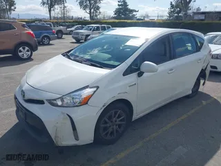 2017 Toyota Prius v Two with VIN JTDZN3EU9HJ063285, listed as a IAAI auction lot 41696704 with 411,285 mi miles. Bid and sale history available at carsss.com. Image 18.