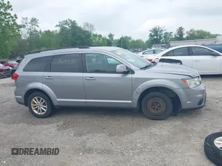 2016 Dodge Journey SXT z VIN 3C4PDDBG4GT173148, wystawiony jako IAAI lot #42269438 z przebiegiem 211 014 mil mil oraz . Historia ofert i sprzedaży dostępna na DreamBid. Obrazek 14.