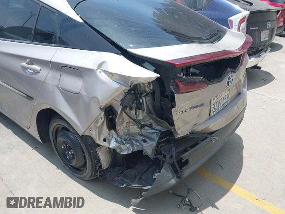 2021 Toyota Prius LE with VIN JTDKAMFP5M3167430, listed as a IAAI auction lot 42462853 with 70,492 mi miles and . Bid and sale history available at DreamBid. Image 12.