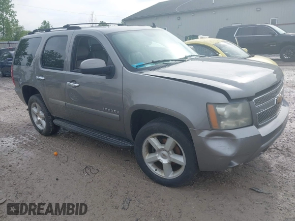 2007 Chevrolet Tahoe LTZ z VIN 1GNFK13047J273945, wystawiony jako IAAI lot #42217598 z przebiegiem Nie podano mil oraz . Historia ofert i sprzedaży dostępna na DreamBid. Obrazek 1.