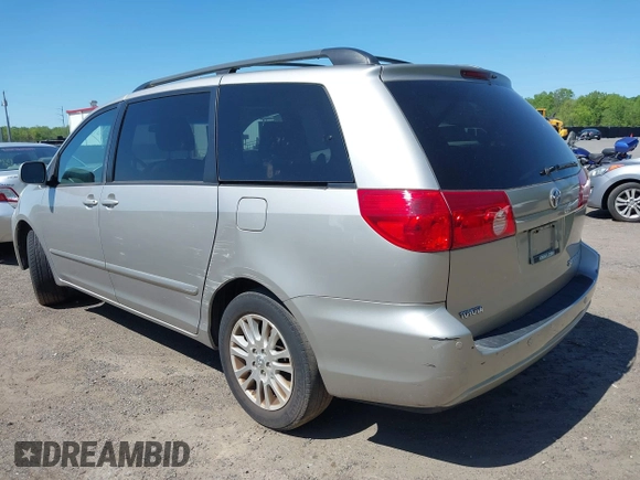 2010 Toyota Sienna XLE with VIN 5TDYK4CC3AS316002, listed as a IAAI auction lot 42138246 with 123,203 mi miles. Bid and sale history available at carsss.com. Image 3.