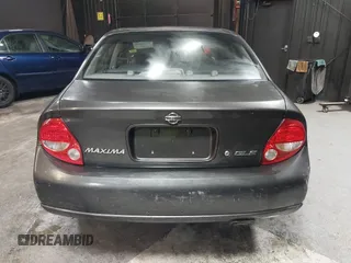 2001 Nissan Maxima SE with VIN JN1CA31A91T112866, listed as a IAAI auction lot 42372546 with 156,069 mi miles and . Bid and sale history available at DreamBid. Image 16.