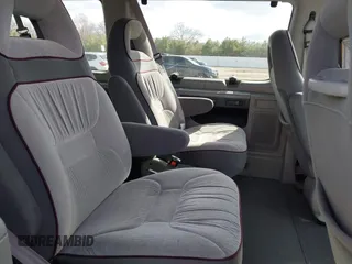 1999 Ford Econoline Passenger XL with VIN 1FMRE11L1XHA05657, listed as a IAAI auction lot 41968923 with 150,868 mi miles and . Bid and sale history available at carsss.com. Image 8.