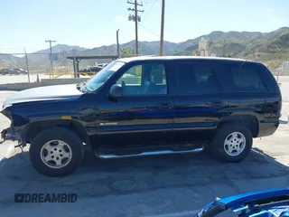 2001 Chevrolet Tahoe LT with VIN 1GNEC13T31R122882, listed as a IAAI auction lot 41999271 with 211,687 mi miles. Bid and sale history available at carsss.com. Image 15.