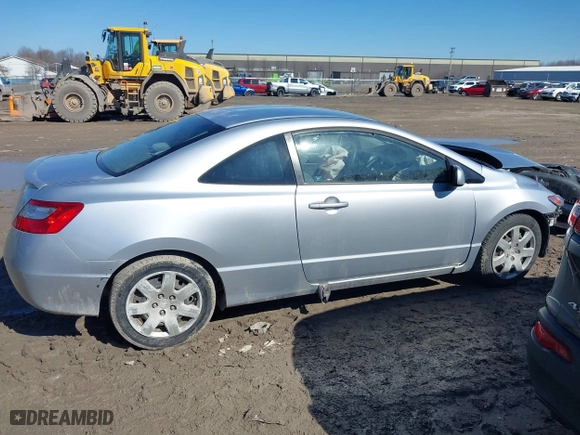 2010 Honda Civic Cpe LX with VIN 2HGFG1B69AH516479, listed as a IAAI auction lot 41757904 with 175,185 mi miles. Bid and sale history available at carsss.com. Image 14.
