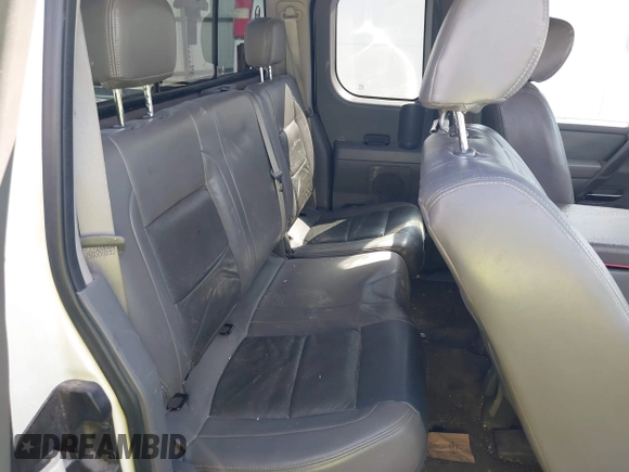 2007 Nissan Titan LE with VIN 1N6BA06A97N202920, listed as a IAAI auction lot 42101546 with 314,018 mi miles and . Bid and sale history available at DreamBid. Image 8.