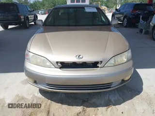 1999 Lexus ES 300 Luxury Sport Sdn with VIN JT8BF28G0X5065317, listed as a IAAI auction lot 42080216 with 163,223 mi miles. Bid and sale history available at carsss.com. Image 6.