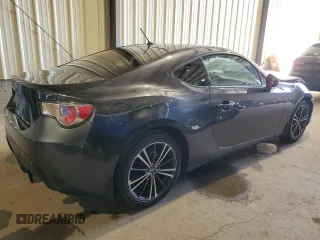 2014 Scion FR-S z VIN JF1ZNAA11E9701435, wystawiony jako Copart lot #72603834 z przebiegiem 127 940 mil mil oraz Szkoda całkowita • Salvage title. Historia ofert i sprzedaży dostępna na DreamBid. Obrazek 3.