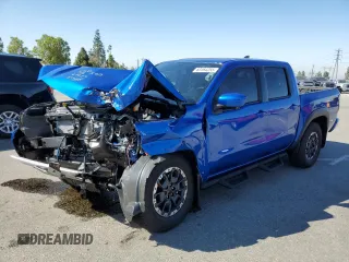 2025 Nissan Frontier Pro-4X with VIN 1N6ED1EK5SN632702, listed as a Copart auction lot 63164255 with 1,917 mi miles and Salvage title. Bid and sale history available at DreamBid. Image 1.