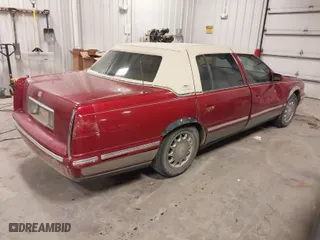 1999 Cadillac DeVille with VIN 1G6KD54Y9XU774473, listed as a IAAI auction lot 41366980 with 140,248 mi miles. Bid and sale history available at carsss.com. Image 4.