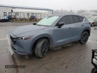 2024 Mazda CX-5 S Carbon Edition z VIN JM3KFBCM6R0367121, wystawiony jako Copart lot #51570125 z przebiegiem 49 762 mil mil oraz Szkody całkowita. Historia ofert i sprzedaży dostępna na DreamBid. Obrazek 1.