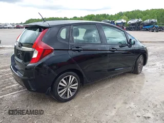 2015 Honda Fit EX-L z VIN 3HGGK5H8XFM733048, wystawiony jako IAAI lot #42267517 z przebiegiem Nie podano mil oraz . Historia ofert i sprzedaży dostępna na DreamBid. Obrazek 4.