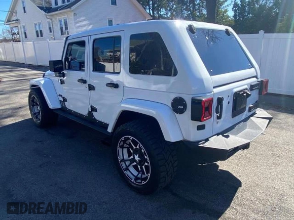 2014 Jeep Wrangler Unlimited Sahara with VIN 1C4BJWEG1EL272951, listed as a Copart auction lot 52157145 with 56,989 mi miles and Clean Title. Bid and sale history available at carsss.com. Image 3.