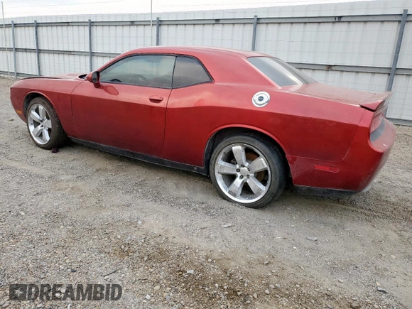 2013 Dodge Challenger SXT z VIN 2C3CDYAG3DH645792, wystawiony jako Copart lot #57351105 z przebiegiem 170 572 mil mil oraz Szkoda całkowita • Salvage title. Historia ofert i sprzedaży dostępna na DreamBid. Obrazek 2.