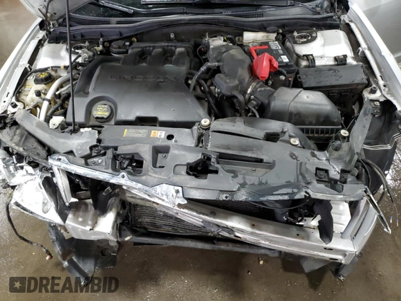 2012 Lincoln MKZ z VIN 3LNHL2GC8CR800745, wystawiony jako Copart lot #50823055 z przebiegiem 94 387 mil mil oraz Szkoda całkowita • Salvage title. Historia ofert i sprzedaży dostępna na DreamBid. Obrazek 12.