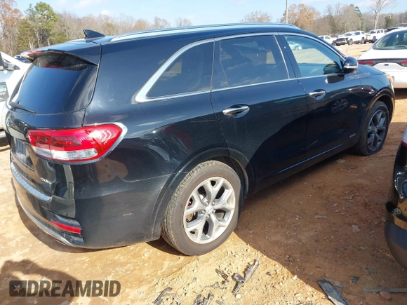 2018 Kia Sorento SX with VIN 5XYPKDA57JG349078, listed as a IAAI auction lot 41136917 with 119,213 mi miles and . Bid and sale history available at carsss.com. Image 4.