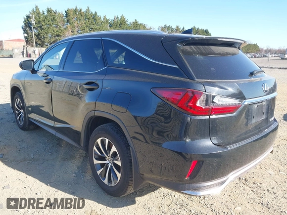 2022 Lexus RX with VIN JTJHZKFA7N2037057, listed as a IAAI auction lot 41804899 with 157,549 mi miles. Bid and sale history available at carsss.com. Image 3.