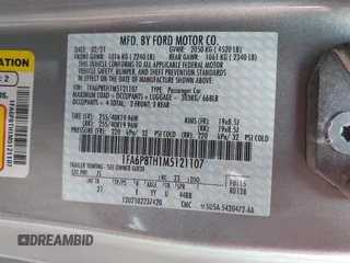 2021 Ford Mustang EcoBoost z VIN 1FA6P8TH1M5121107, wystawiony jako IAAI lot #42204097 z przebiegiem 51 542 mil mil oraz . Historia ofert i sprzedaży dostępna na DreamBid. Obrazek 9.