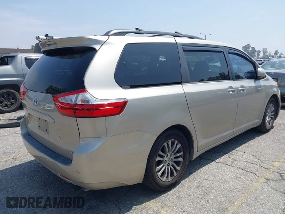 2015 Toyota Sienna XLE with VIN 5TDYK3DC4FS560743, listed as a IAAI auction lot 42488745 with 145,009 mi miles and . Bid and sale history available at DreamBid. Image 4.