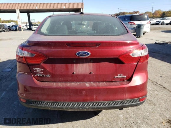 2014 Ford Focus SE with VIN 1FADP3F20EL340123, listed as a Copart auction lot 77626984 with 69,487 mi miles and Salvage Title. Bid and sale history available at DreamBid. Image 6.