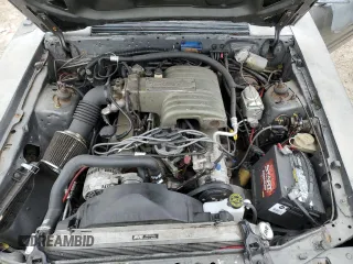 1986 Ford Mustang with VIN 1FABP28T8GF109009, listed as a Copart auction lot 83148544 with 329,005 mi miles and Salvage title. Bid and sale history available at DreamBid. Image 11.