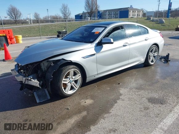 2015 BMW 6 Series 640i xDrive with VIN WBA6B8C52FD453433, listed as a IAAI auction lot 41805317 with 138,685 mi miles and . Bid and sale history available at carsss.com. Image 18.