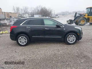 2018 Cadillac XT5 FWD with VIN 1GYKNARS6JZ160993, listed as a IAAI auction lot 41472847 with 113,415 mi miles. Bid and sale history available at carsss.com. Image 13.