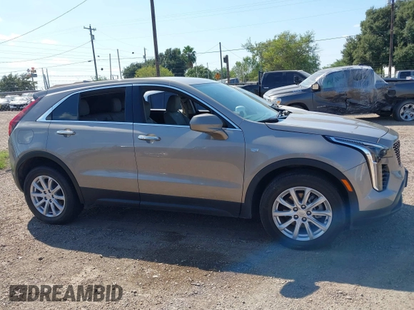 2023 Cadillac XT4 FWD Luxury with VIN 1GYAZAR4XPF116698, listed as a IAAI auction lot 40594015 with 18,368 mi miles. Bid and sale history available at carsss.com. Image 13.
