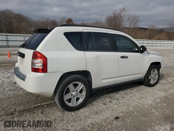 2009 Jeep Compass North with VIN 1J4FT47B49D196637, listed as a Copart auction lot 82918314 with 156,117 mi miles and Clean Title. Bid and sale history available at carsss.com. Image 3.