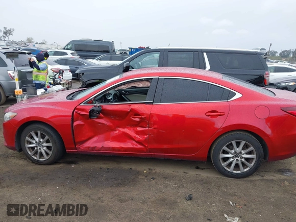 2016 Mazda 6 i Sport with VIN JM1GJ1U54G1457194, listed as a IAAI auction lot 41725704 with 109,628 mi miles and . Bid and sale history available at DreamBid. Image 14.