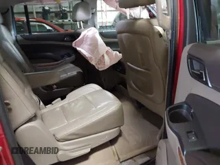 2015 Chevrolet Suburban LTZ z VIN 1GNSKKKC7FR218034, wystawiony jako IAAI lot #41884644 z przebiegiem 160 721 mil mil oraz . Historia ofert i sprzedaży dostępna na DreamBid. Obrazek 8.