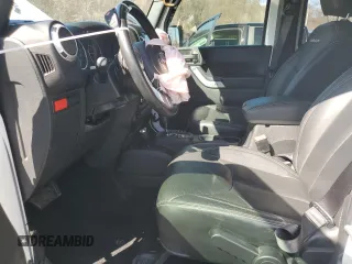 2017 Jeep Wrangler Unlimited Rubicon with VIN 1C4HJWFG9HL543266, listed as a Copart auction lot 50002055 with 50,223 mi miles and Salvage title. Bid and sale history available at DreamBid. Image 7.