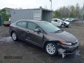 2012 Honda Civic EX-L with VIN 2HGFB2F9XCH505616, listed as a IAAI auction lot 41935511 with 62,298 mi miles and . Bid and sale history available at DreamBid. Image 1.