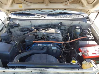 2001 Toyota Tundra SR5 with VIN 5TBRN341X1S166076, listed as a IAAI auction lot 41611961 with 177,097 mi miles and . Bid and sale history available at DreamBid. Image 10.
