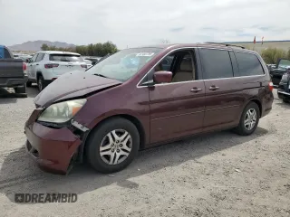 2007 Honda Odyssey EX with VIN 5FNRL38467B425337, listed as a Copart auction lot 52450795 with 143,791 mi miles and Salvage Title. Bid and sale history available at carsss.com. Image 1.