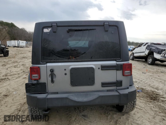 2015 Jeep Wrangler Unlimited Willys Wheeler with VIN 1C4BJWDG4FL723924, listed as a Copart auction lot 47145245 with 166,256 mi miles and Salvage Title. Bid and sale history available at DreamBid. Image 6.