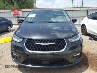 2023 Chrysler Pacifica Hybrid Touring L with VIN 2C4RC1L70PR622000, listed as a IAAI auction lot 42711826 with 65,109 mi miles and . Bid and sale history available at DreamBid. Image 13.
