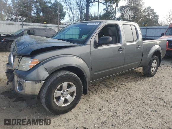 2009 Nissan Frontier SE z VIN 1N6AD09W69C423948, wystawiony jako Copart lot #50600545 z przebiegiem 221 181 mil mil oraz Czysty tytuł • Clean title. Historia ofert i sprzedaży dostępna na DreamBid. Obrazek 1.