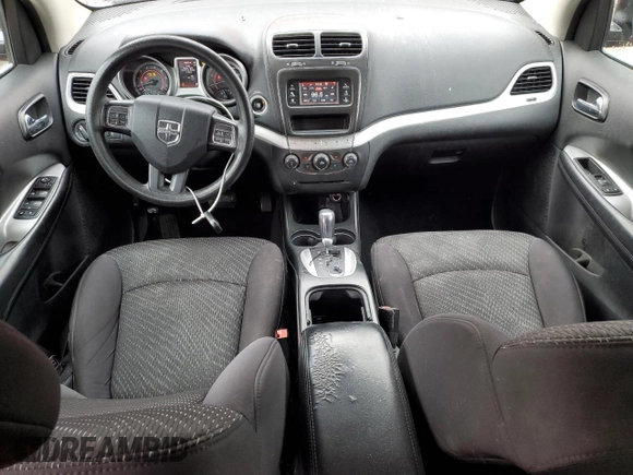 2013 Dodge Journey SE with VIN 3C4PDCAB3DT723547, listed as a Copart auction lot 48140495 with 159,979 mi miles and Salvage title. Bid and sale history available at DreamBid. Image 8.