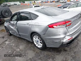 2020 Ford Fusion SE with VIN 3FA6P0HD5LR150418, listed as a IAAI auction lot 42347924 with 87,817 mi miles and . Bid and sale history available at DreamBid. Image 3.