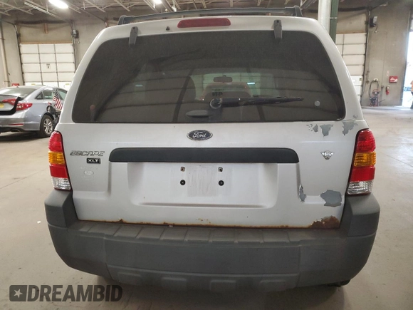 2007 Ford Escape XLT with VIN 1FMYU93177KA14990, listed as a Copart auction lot 77816054 with 202,901 mi miles and Clean Title. Bid and sale history available at carsss.com. Image 6.