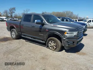 2019 Ram 2500 Laramie with VIN 3C6UR5FL7KG521132, listed as a IAAI auction lot 41806360 with 140,196 mi miles and . Bid and sale history available at DreamBid. Image 1.