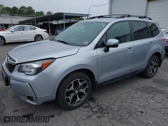 2014 Subaru Forester XT Touring with VIN JF2SJGMC1EH552474, listed as a IAAI auction lot 42461663 with 121,482 mi miles and . Bid and sale history available at DreamBid. Image 2.