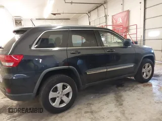 2012 Jeep Grand Cherokee Laredo with VIN 1C4RJFAG5CC351539, listed as a IAAI auction lot 41861533 with 166,909 mi miles. Bid and sale history available at carsss.com. Image 13.