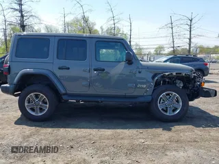 2022 Jeep Wrangler Unlimited Sahara with VIN 1C4HJXEM7NW206585, listed as a IAAI auction lot 42102516 with 10,769 mi miles and . Bid and sale history available at DreamBid. Image 14.